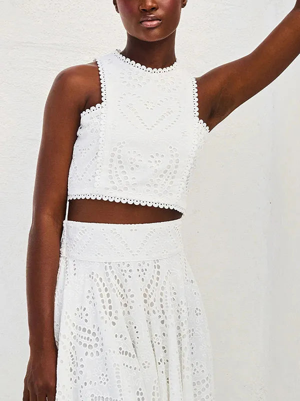 Exquisito top y falda de encaje hueco bordado sin mangas