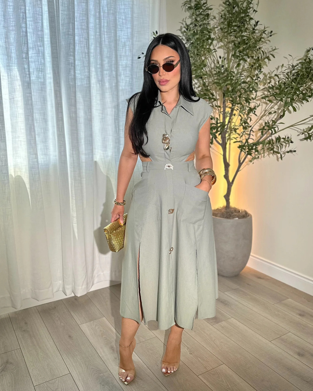 Elegante vestido sin mangas con botones decorativos®