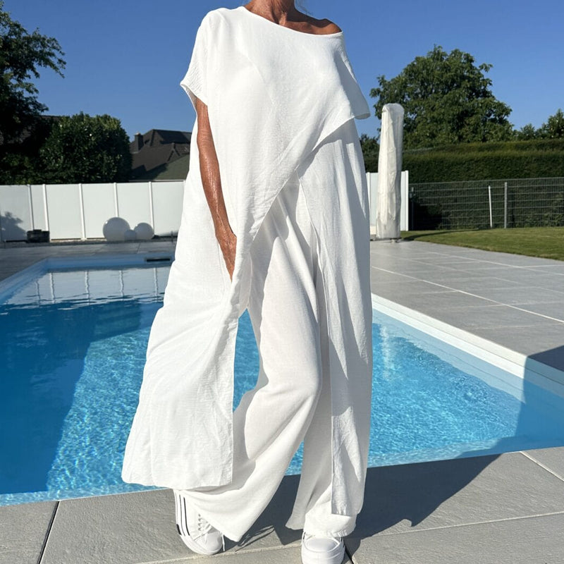 Conjunto de top y pantalón con hombros descubiertos en color liso